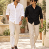 Two Indian male models walking in black and white linen shirts