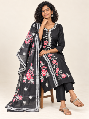 Black rose embroidered suit on a consistent female model, pose 4